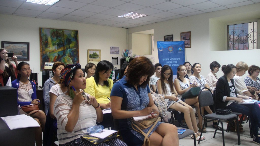 Participants listen at the Aug. 1 public speaking skills seminar of the Women’s Leadership School, coached by Svetlana Kaplina.
