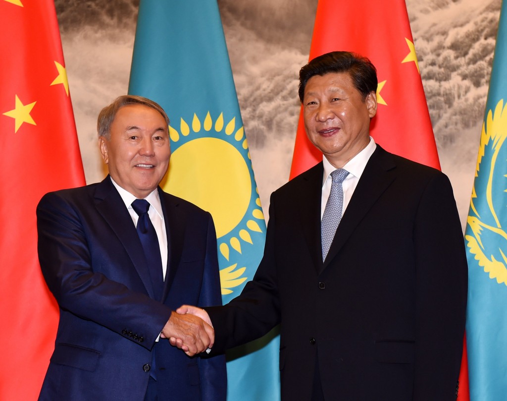 President of Kazakhstan Nursultan Nazarbayev (L) meets Chinese President Xi Jinping in Beijing. 