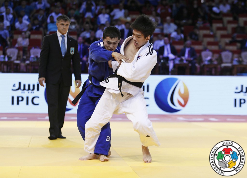 Kazakh judoka Magzhan Shamshadin fights Harim Lee of South Korea in Abu Dhabi. 