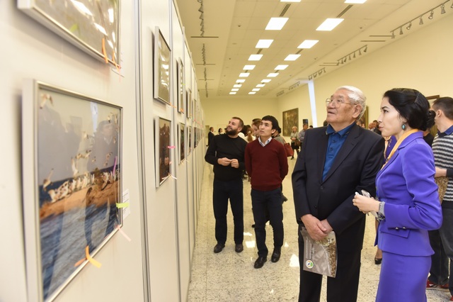 Visitors look at entries in the wildlife photo competition at the National Museum of Kazakhstan in Astana. Photo: national museum.kz