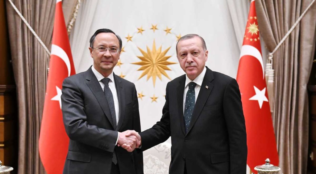 Kairat Abdrakhmanov and Recep Tayyip Erdoğan.