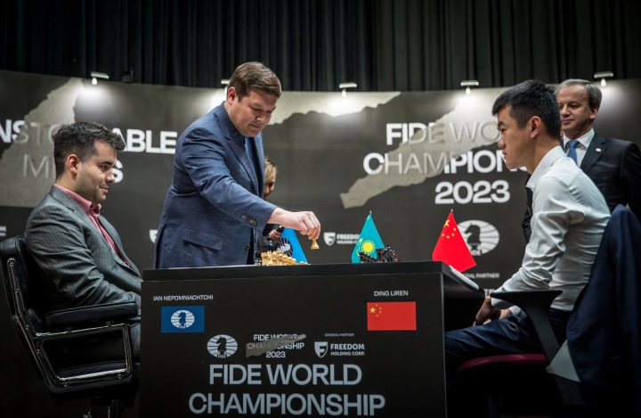 China's Ding Liren, left, and Russia's Ian Nepomniachtchi shake hands prior  to their FIDE World Chess Championship in Astana, Kazakhstan, Saturday,  April 29, 2023. Ian Nepomniachtchi and Ding Liren are facing off