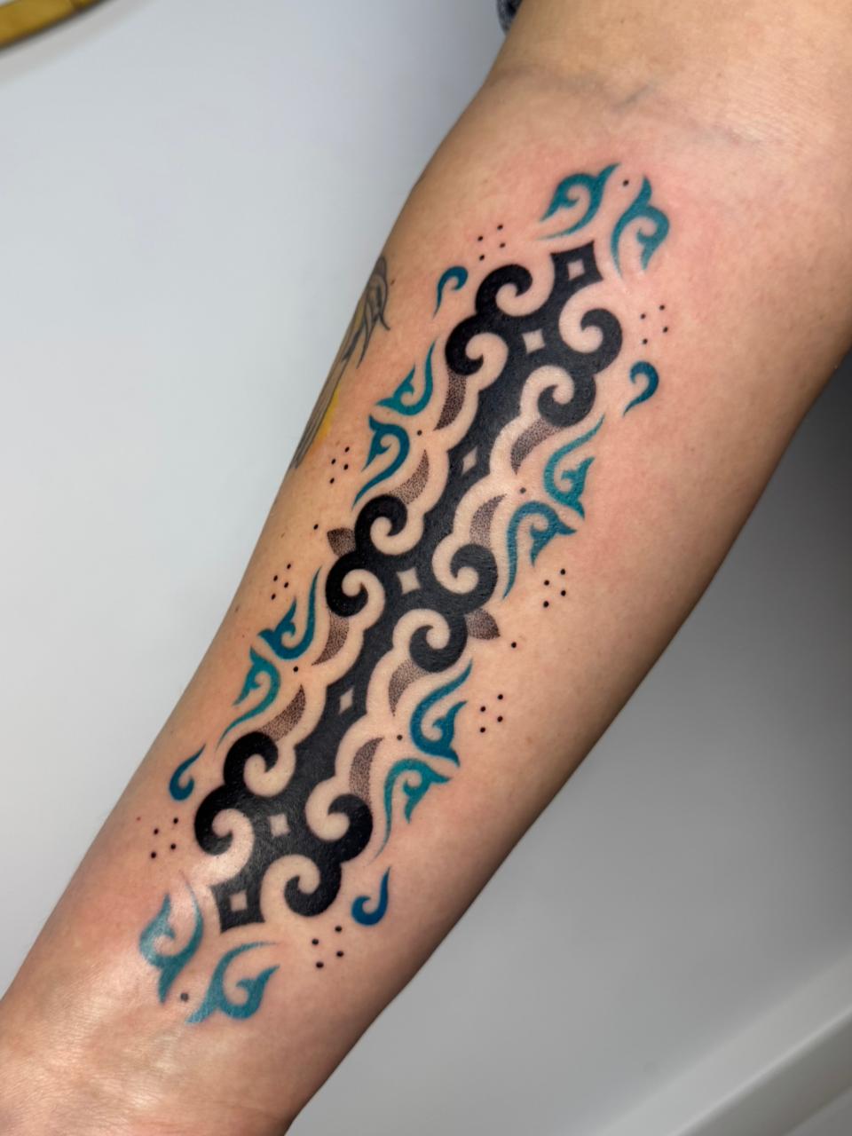 Kazakh Tattoo Artist Reimagines National Heritage in Contemporary Ink